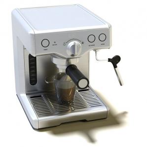 咖啡机、接有咖啡的杯子