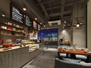 带有蛋糕甜点、水吧台的工业风咖啡厅