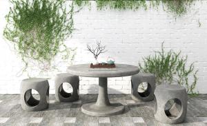 中式圆形石桌、石凳和植物墙庭院景观小品