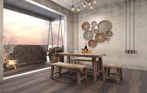 旧家具水泥墙的工业风民宿餐厅