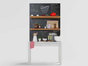 放在黑色涂鸦背景墙下厨具收纳架