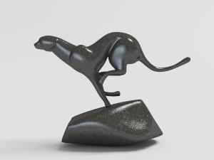 在岩石上奔跑的黑豹金属雕像