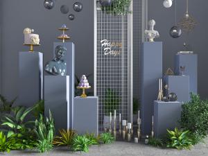 北欧庭院灰色方形柱子雕塑、烛台和植物