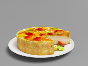 放在白色陶瓷盘里的水果奶油蛋糕