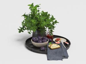 黑色哑光托盘里的水果食物和植物