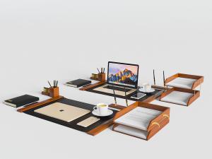 办公桌上的笔记本电脑、文件架等办公文具