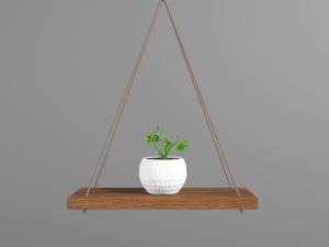 实木吊板上的白色陶瓷盆景盆栽