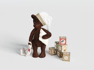 棕色小熊布绒玩偶、兔子和儿童积木玩具