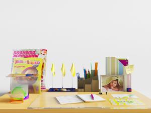 书桌上的饰品摆件、笔、纸