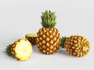 切成两半和两个完整的菠萝水果