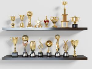 现代摆放在置物板上的奖杯奖牌3d模型 现代摆放在置物板上的奖杯奖牌