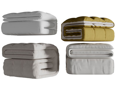 叠成块状的被褥生活用品